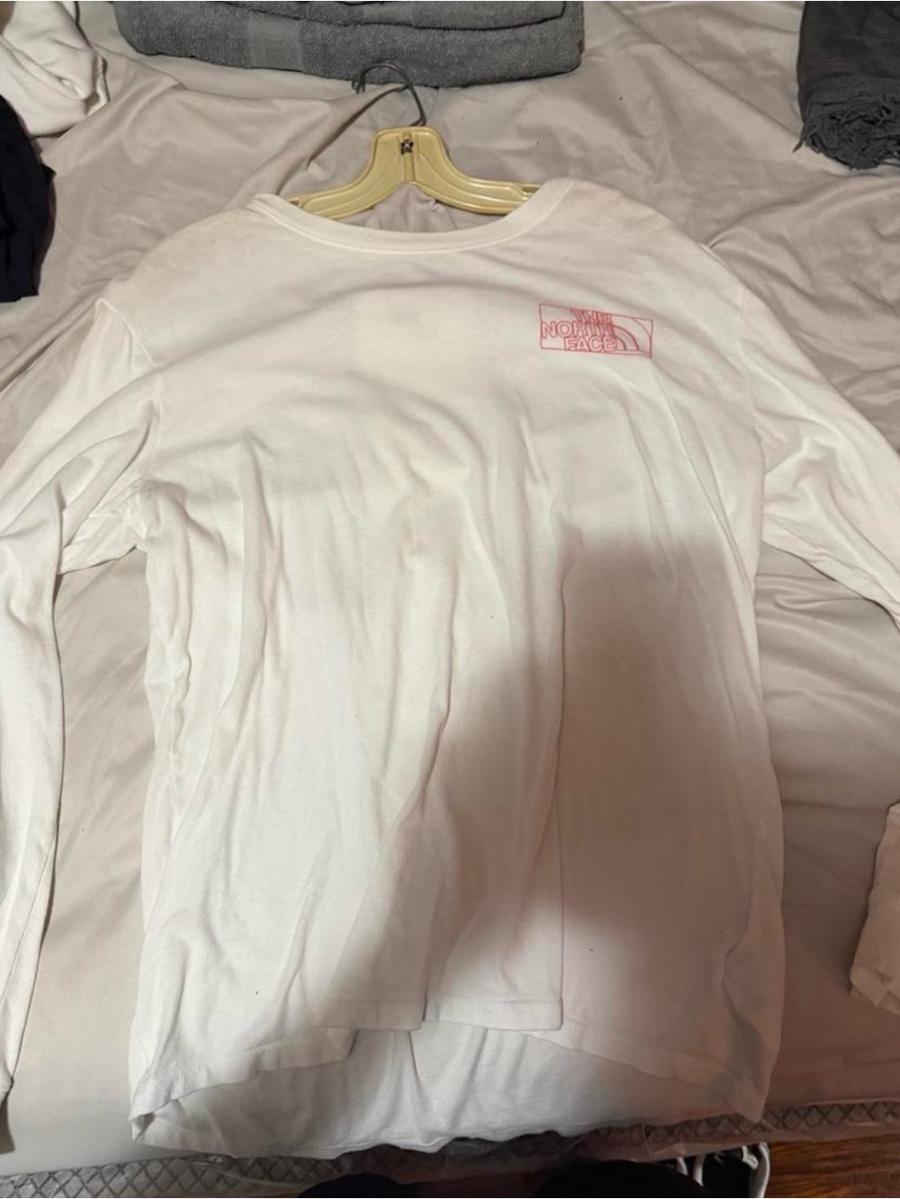 The North Face White Long Sleeve Shirt with Pink Logo. Size L.